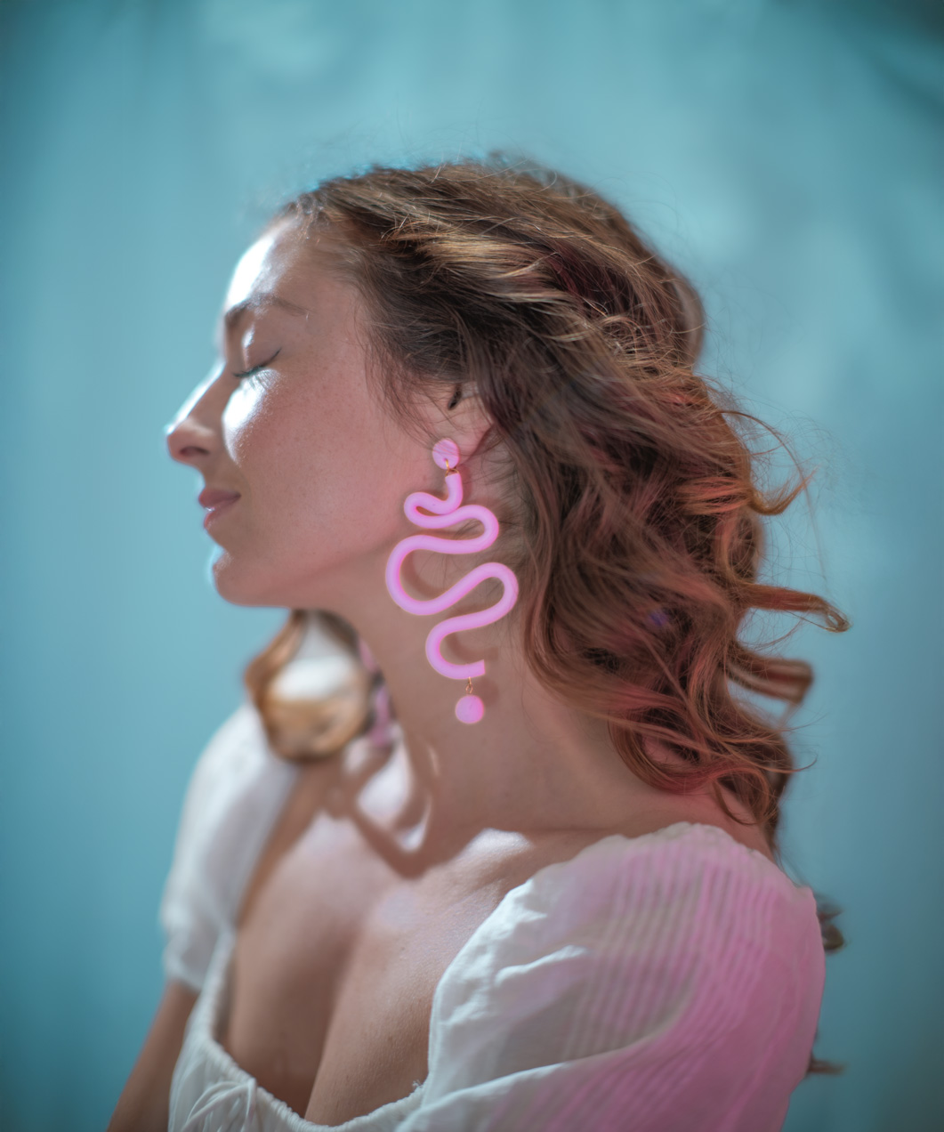 Squiggles earrings worn by Natalie Lisa Moore